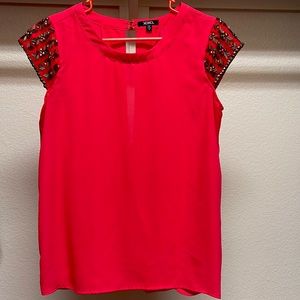 Red blouse with open back